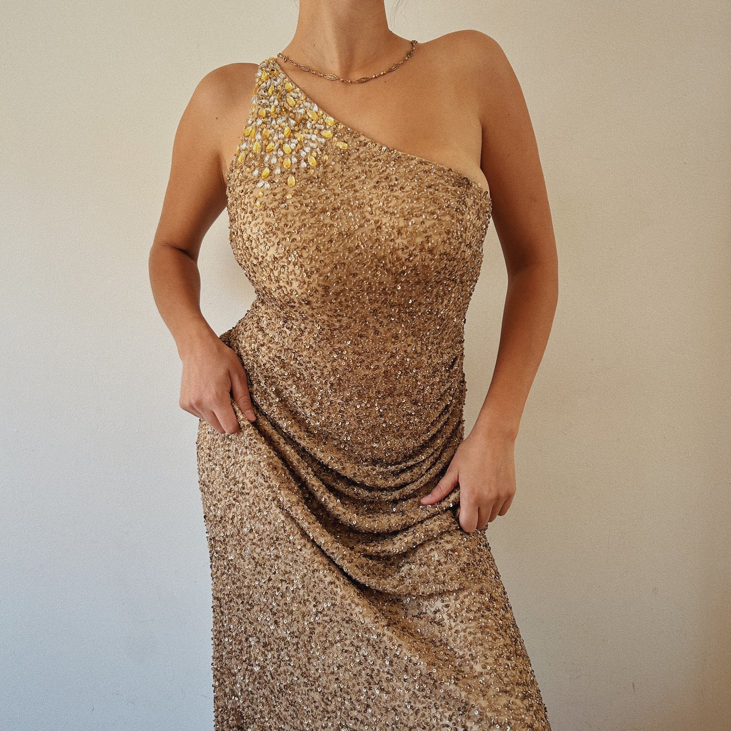 Stunning Golden One Shoulder Beaded Gown